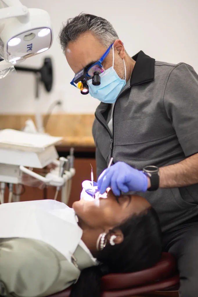 Dr. Kourosh Yousefzadeh treating a patient chairside