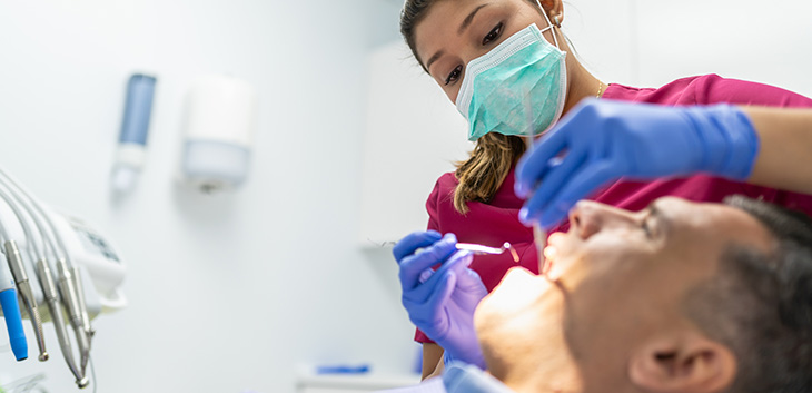 Man having his teeth cleaned