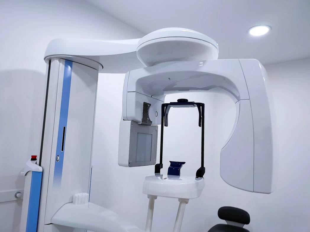 A 3D cone beam CT scanner in a treatment room